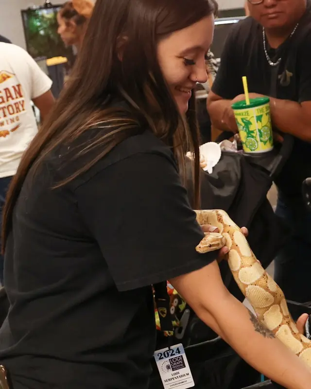 Jasmyn with a ball python